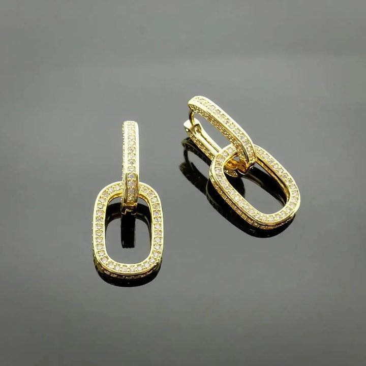 Gold-colored link earrings with zirconia