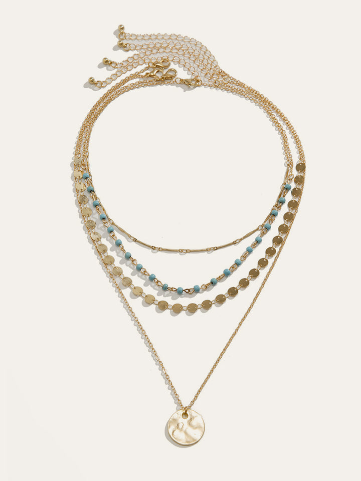 Gold-Tone Layered Necklace with Beads and Disc Pendant