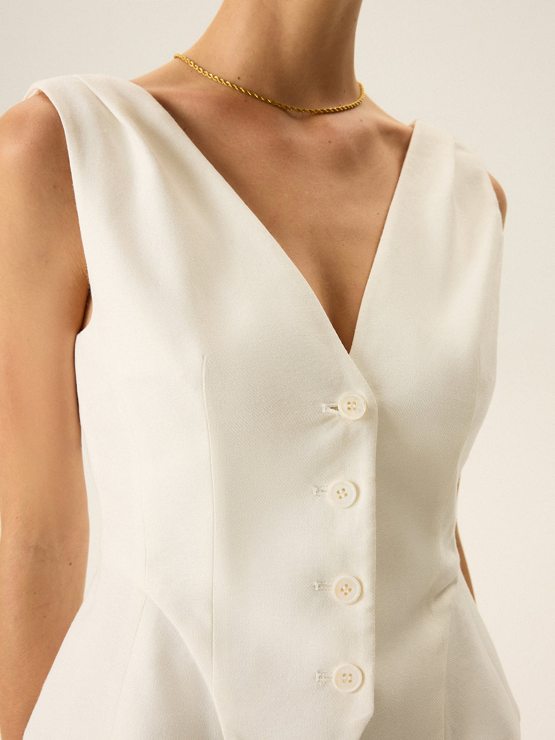 Button-Front Peplum Vest