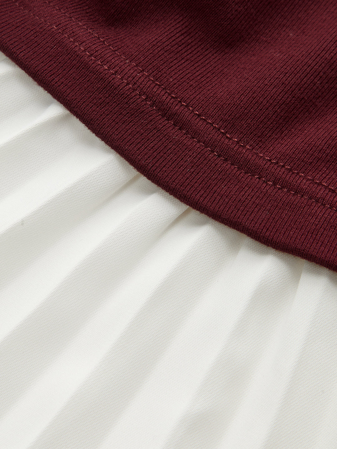 Contrast-Paneled Pleated Peplum T-Shirt