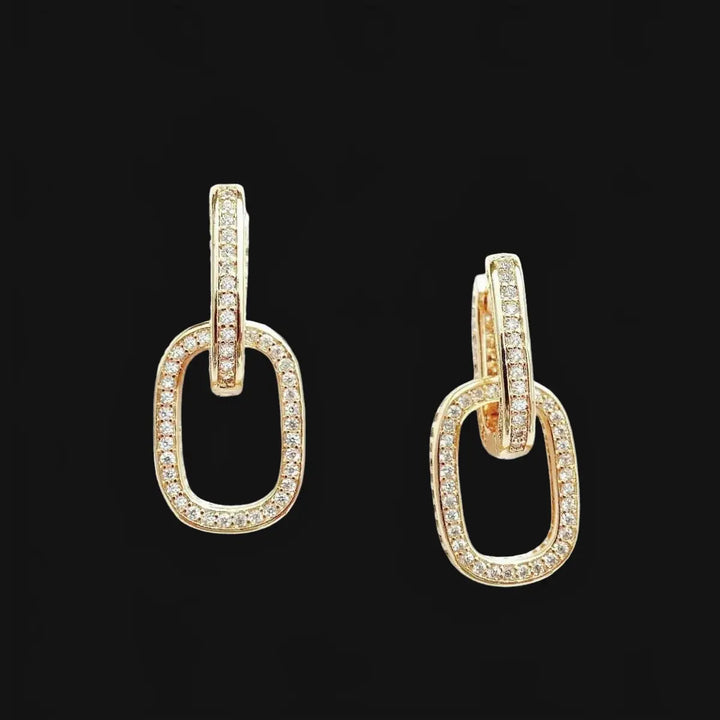 Gold-colored link earrings with zirconia