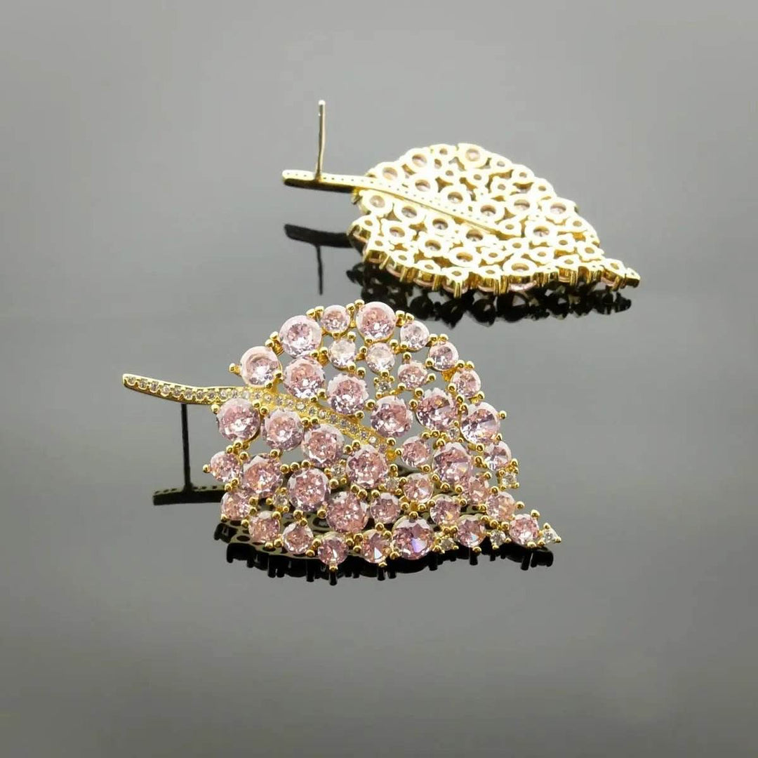 Gold-colored Earrings with Pink Zirconia Stones