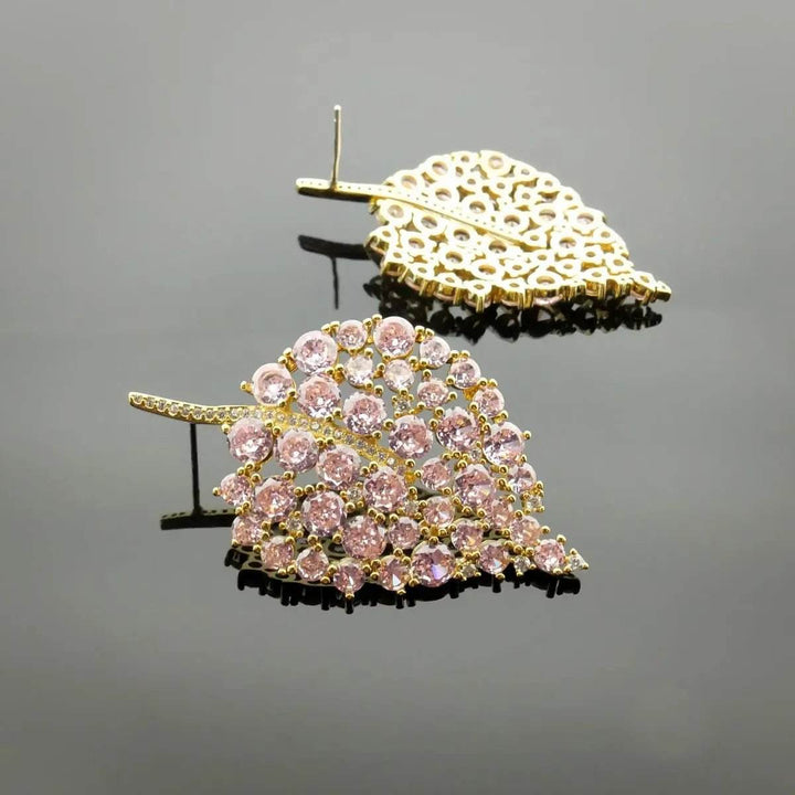 Gold-colored Earrings with Pink Zirconia Stones