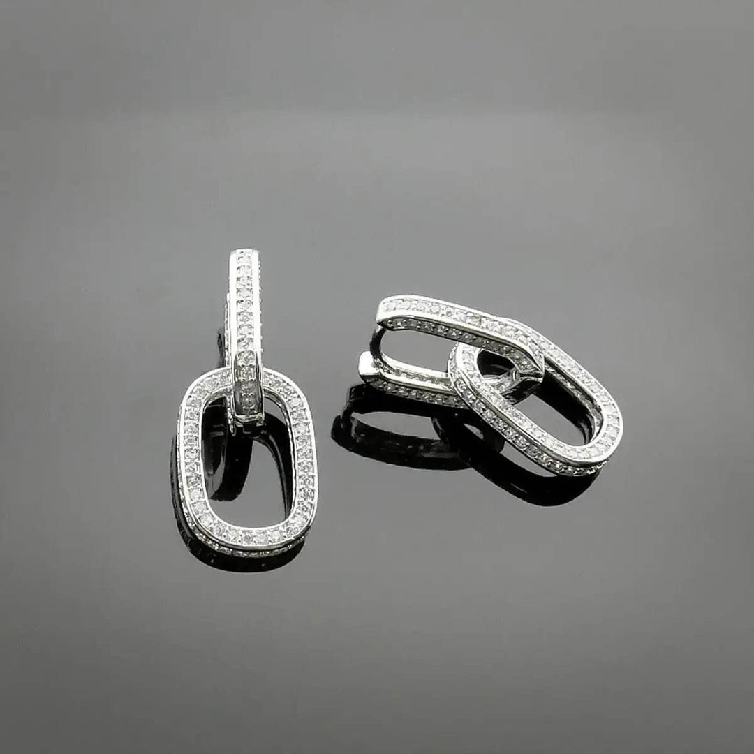 Silver-colored link earrings with zirconia