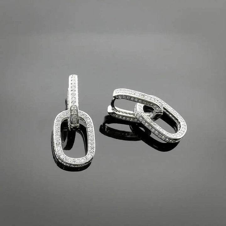 Silver-colored link earrings with zirconia