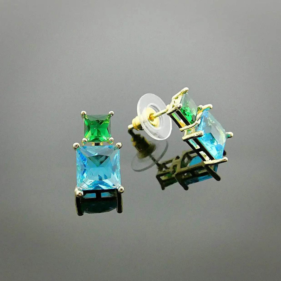 Gold-colored earrings with blue and green zirconias