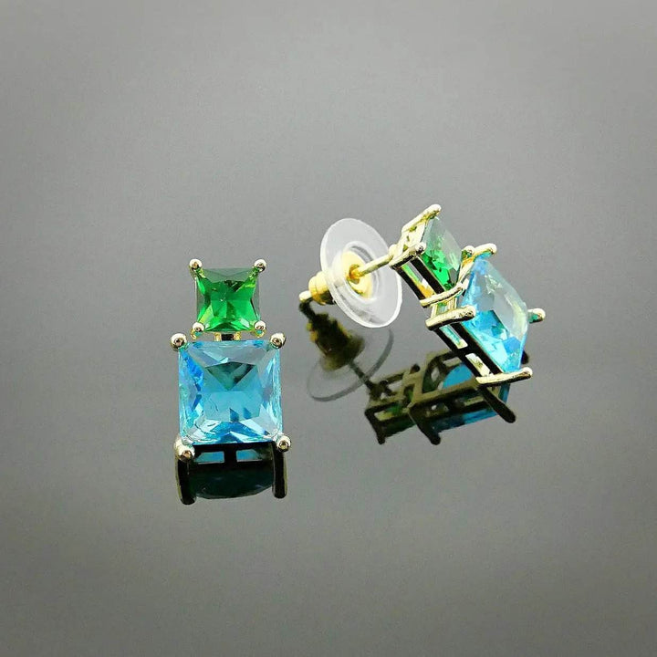 Gold-colored earrings with blue and green zirconias