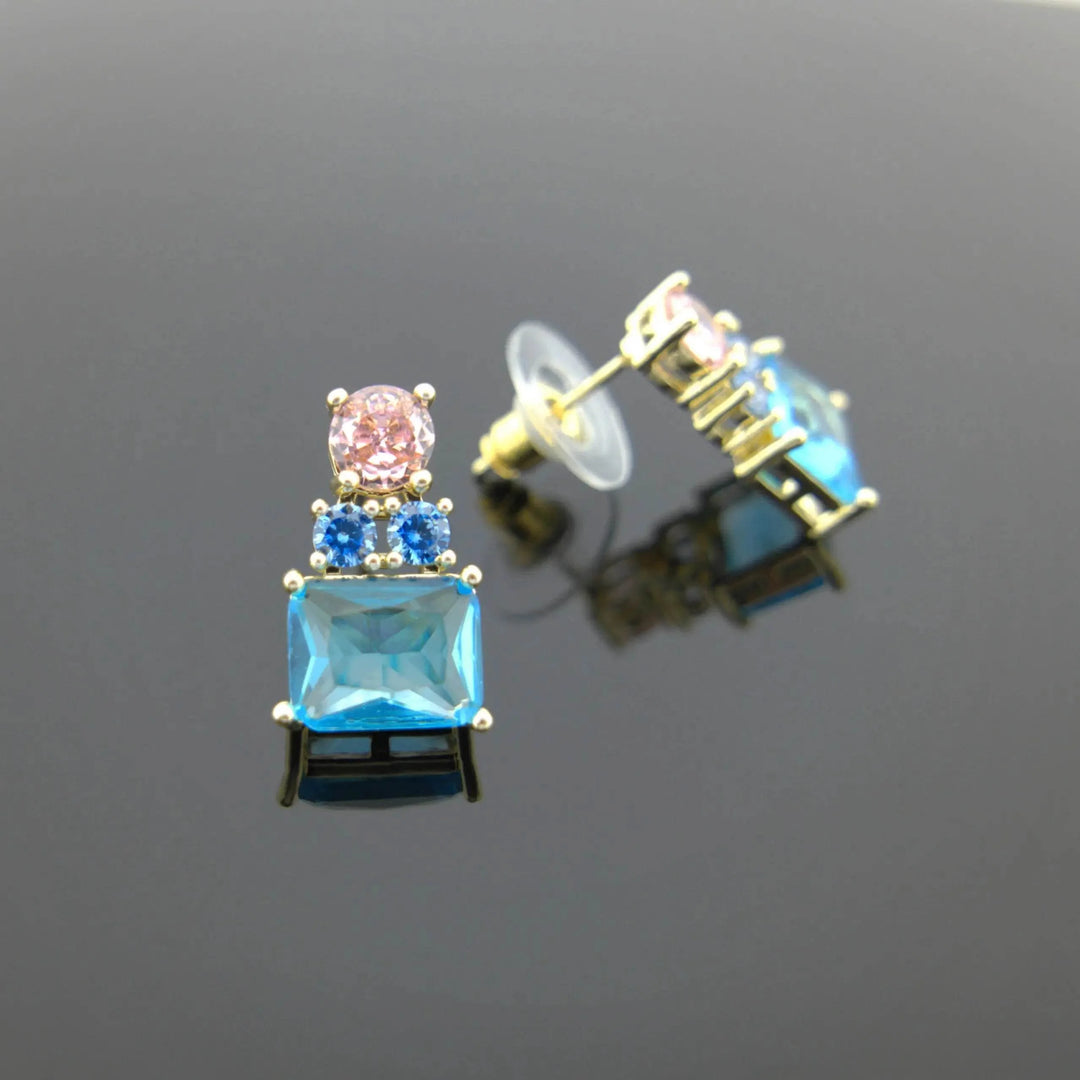 Gold-colored earrings with pink and blue zirconias