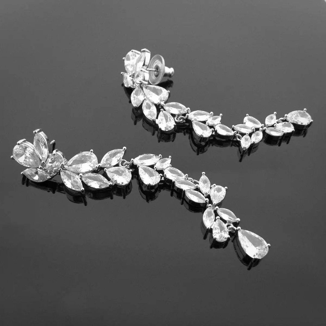 Silver-colored long leaf earrings with zirconia