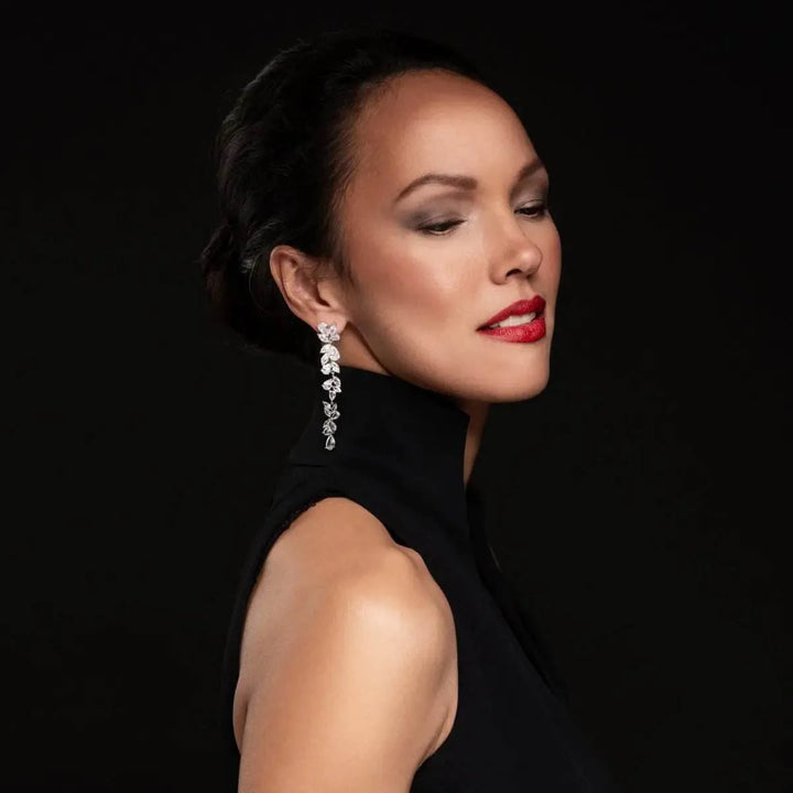 Silver-colored long leaf earrings with zirconia