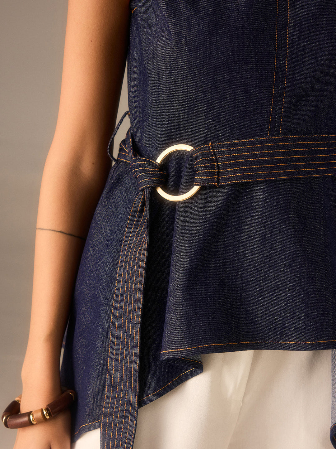 Denim Peplum Belted Top with Asymmetric Hem