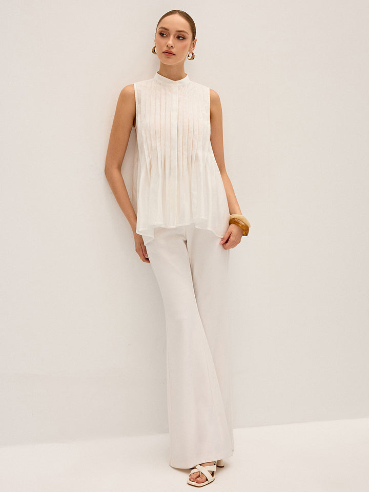 Semi-Sheer Pleated Mock Neck Blouse