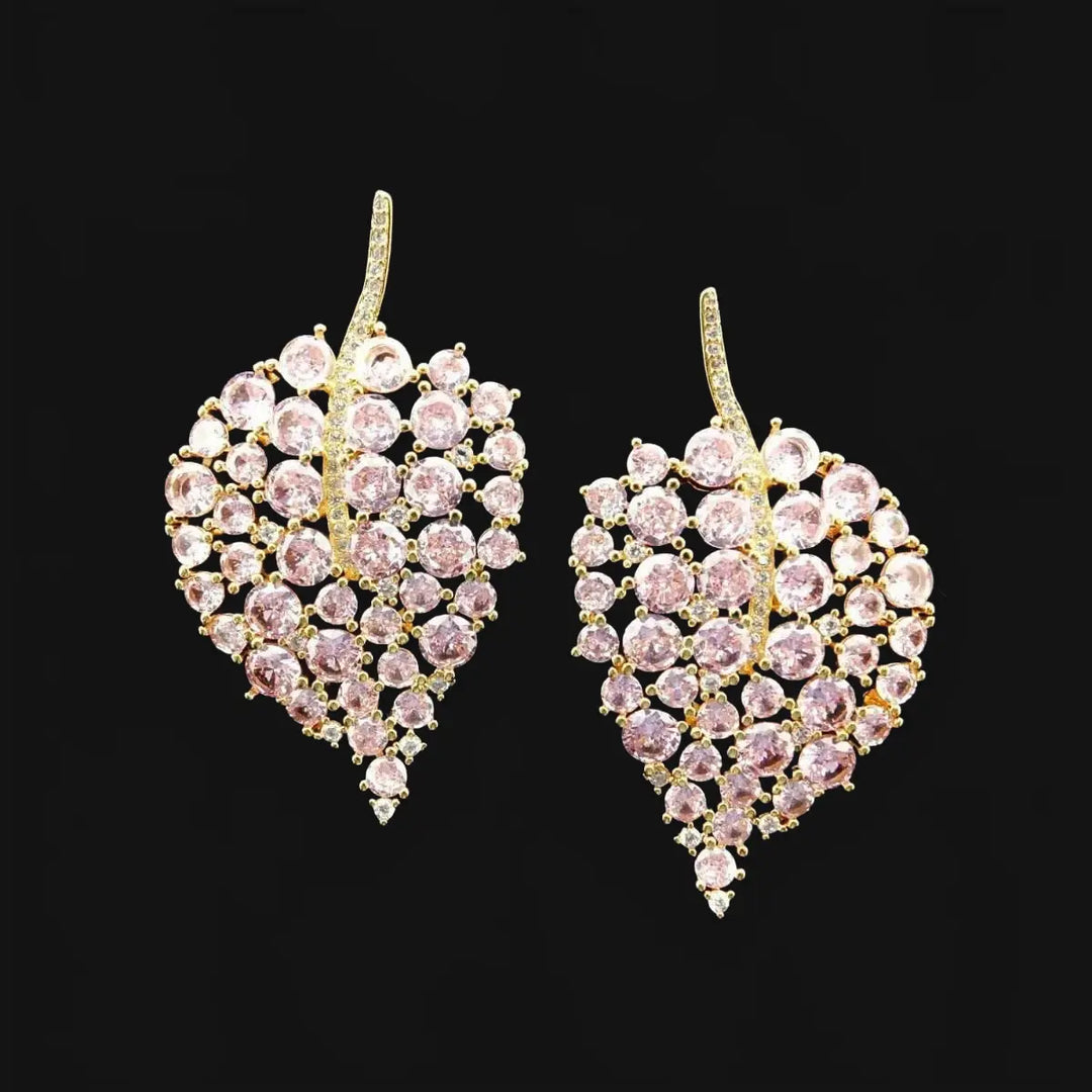 Gold-colored Earrings with Pink Zirconia Stones
