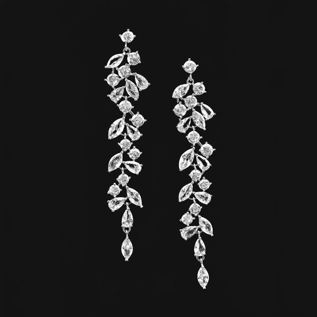 Silver-colored leaf dance earrings with zirconia