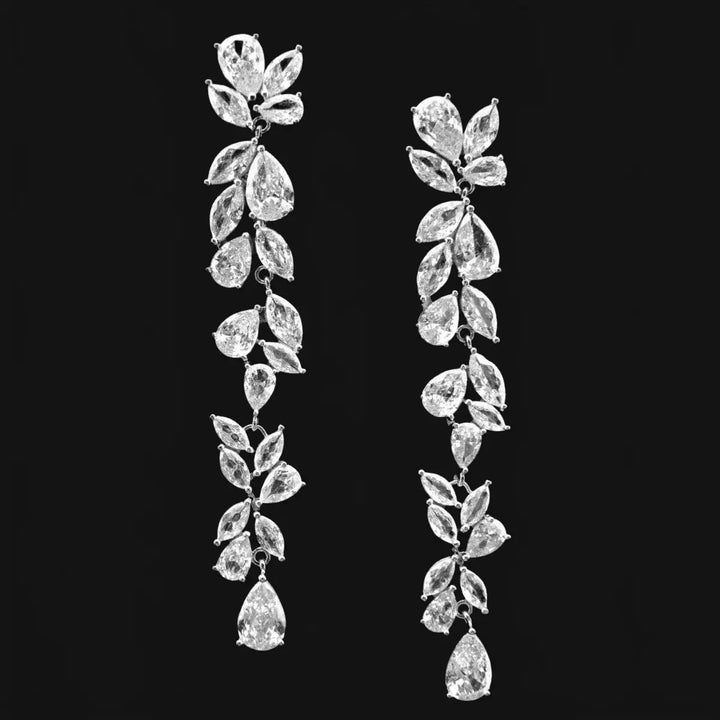 Silver-colored long leaf earrings with zirconia