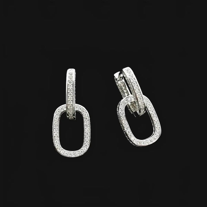 Silver-colored link earrings with zirconia